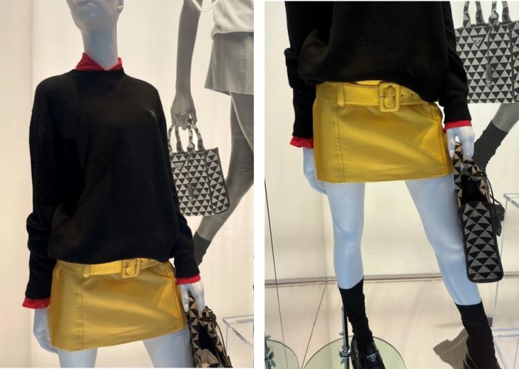 Vitrine da Prada em Milão manequim veste minissaia amarelo fluor e blusa preta