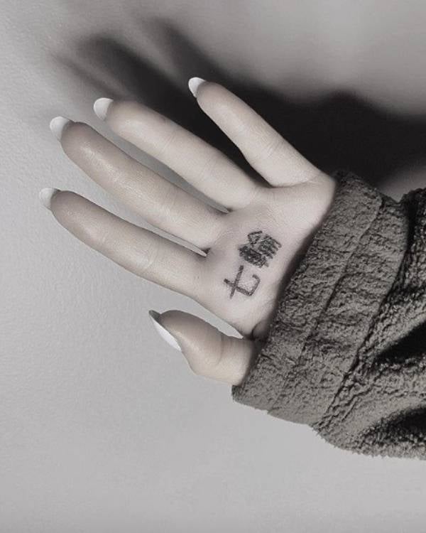 Ariana Grande's tattoo photo.