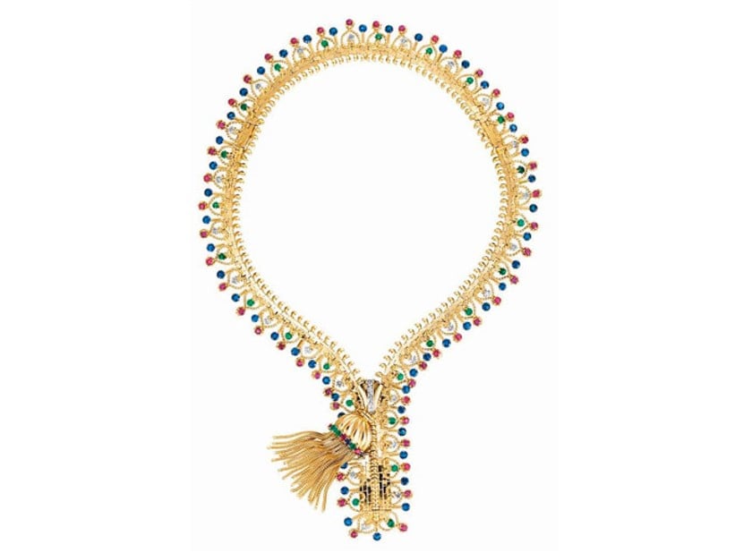 Foto de um colar de luxo em estilo zíper em ouro e pedrarias da coleção Collana Zip de Van Cleef & Arpels