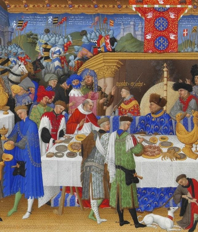 Cena medieval de um banquete e batalha