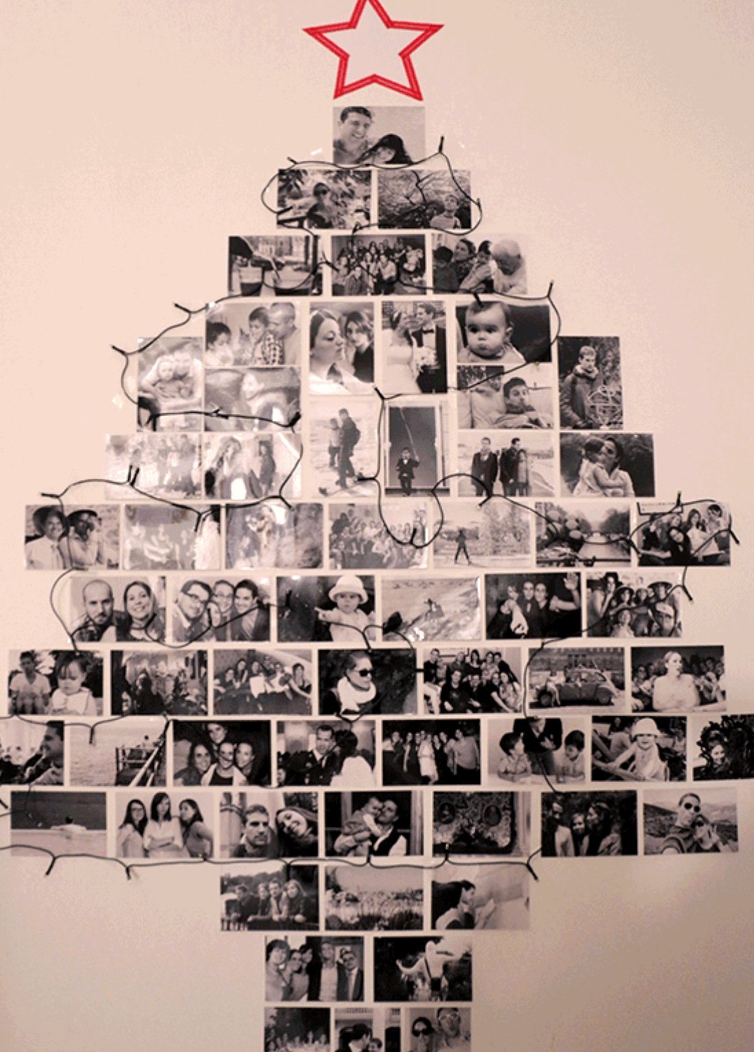 árvore de natal com fotos de família