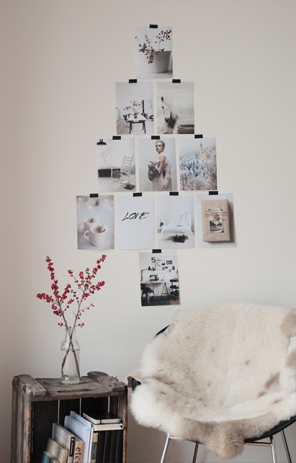 árvore natalina de fotos na parede