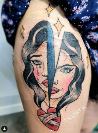 Tattoo mulher chorando com coração partido