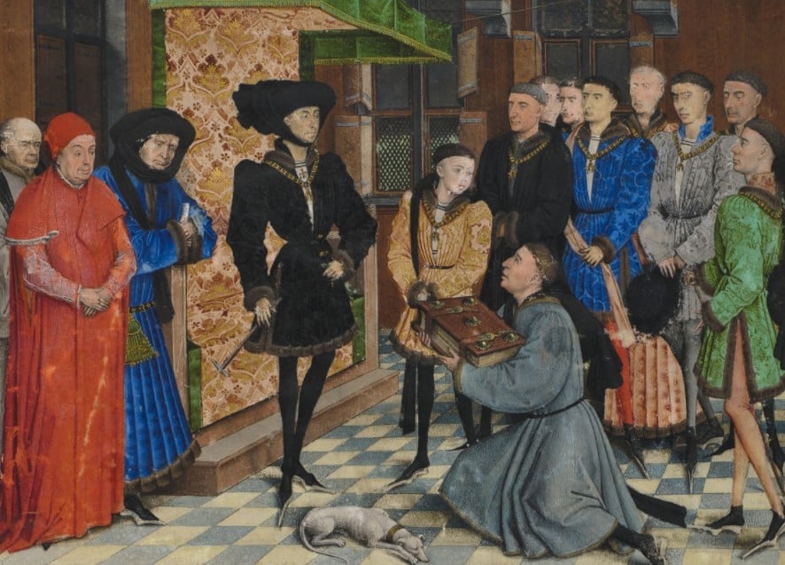 Pintura na qual aparece Filipe "o bom", duque de Borgonha, posando no centro com um traje preto com botões e um chapéu e rodeado de pessoas, com alguém a lhe oferecer um livro