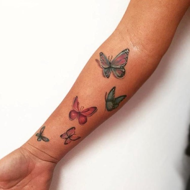 Tatuagem feminina no braço: Borboleta 