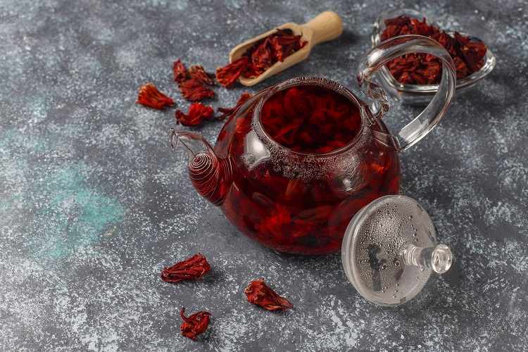 Foto chá de hibisco para emagrecer em bule de vidro