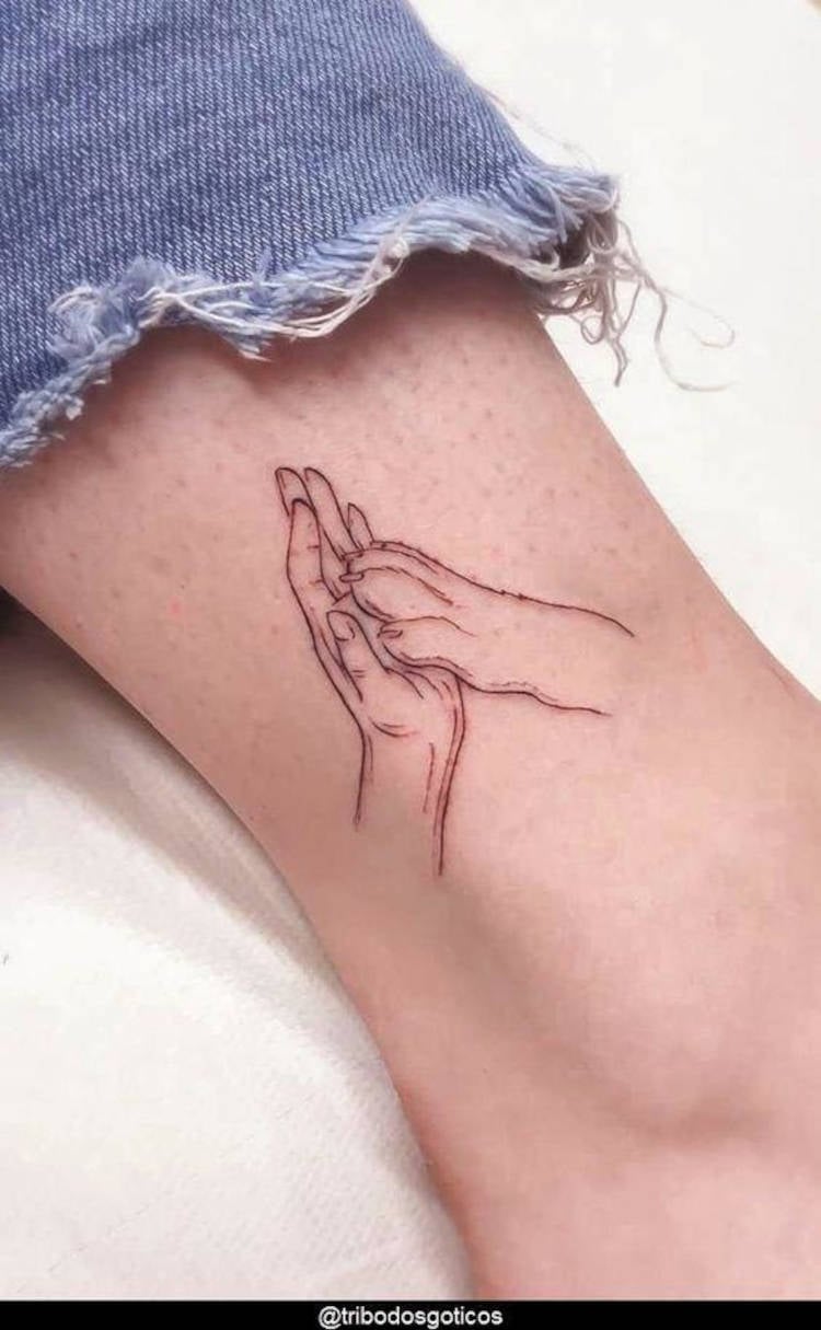 Tatuagem em homenagem a cachorro