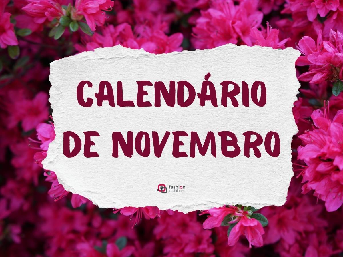 fundo de azaleias cor-de-rosa com pedaço de papel onde se lê calendário de novembro