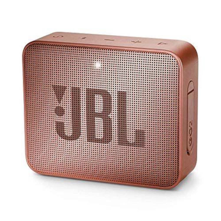 Caixa de som JBL na cor rosa.