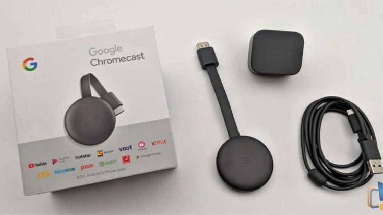 Google chromecast  com a caixa.