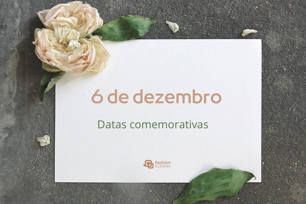 Papel com folhas em cima escrito "6 de dezembro"