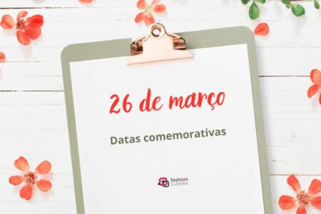 26 de março escrito em folha em prancheta.