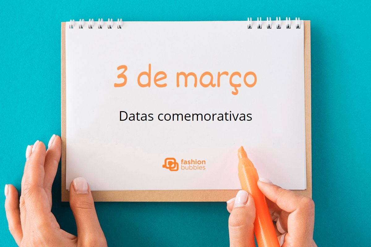 "3 de março" escrito de laranja em caderno com folha branca.