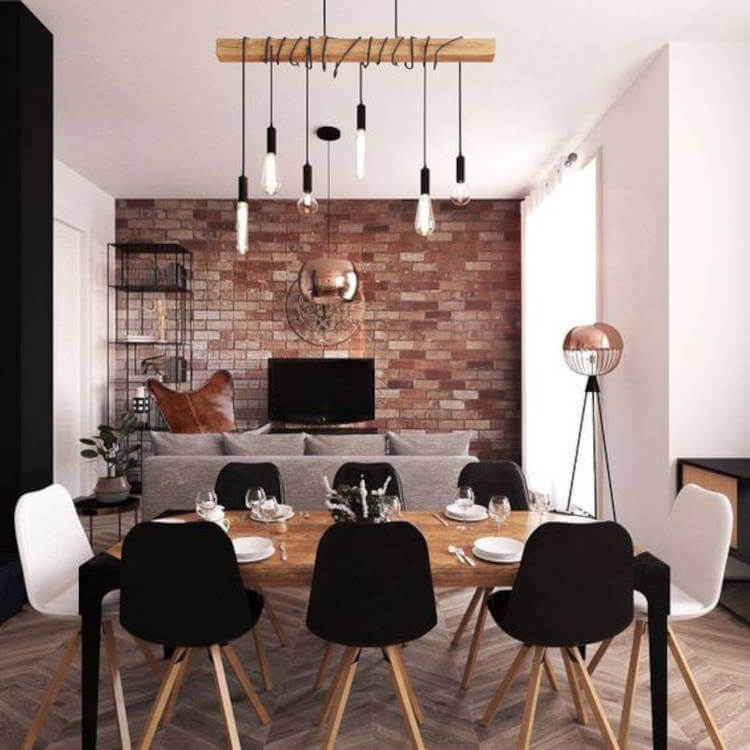 Casa com salas integradas. Décor industrial em salas de estar e jantar.