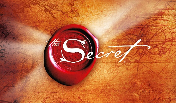 Capa do documentário O Segredo com um fundo parecido com um pergaminho e a um fecho de carta antigo cartaz do filme The Secret, O Segredo em inglês