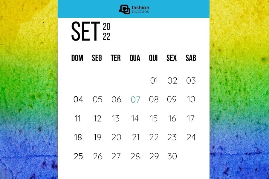 calendário de setembro de 2022 escrito sobre fundo nos tons de amarelo, verde e azul