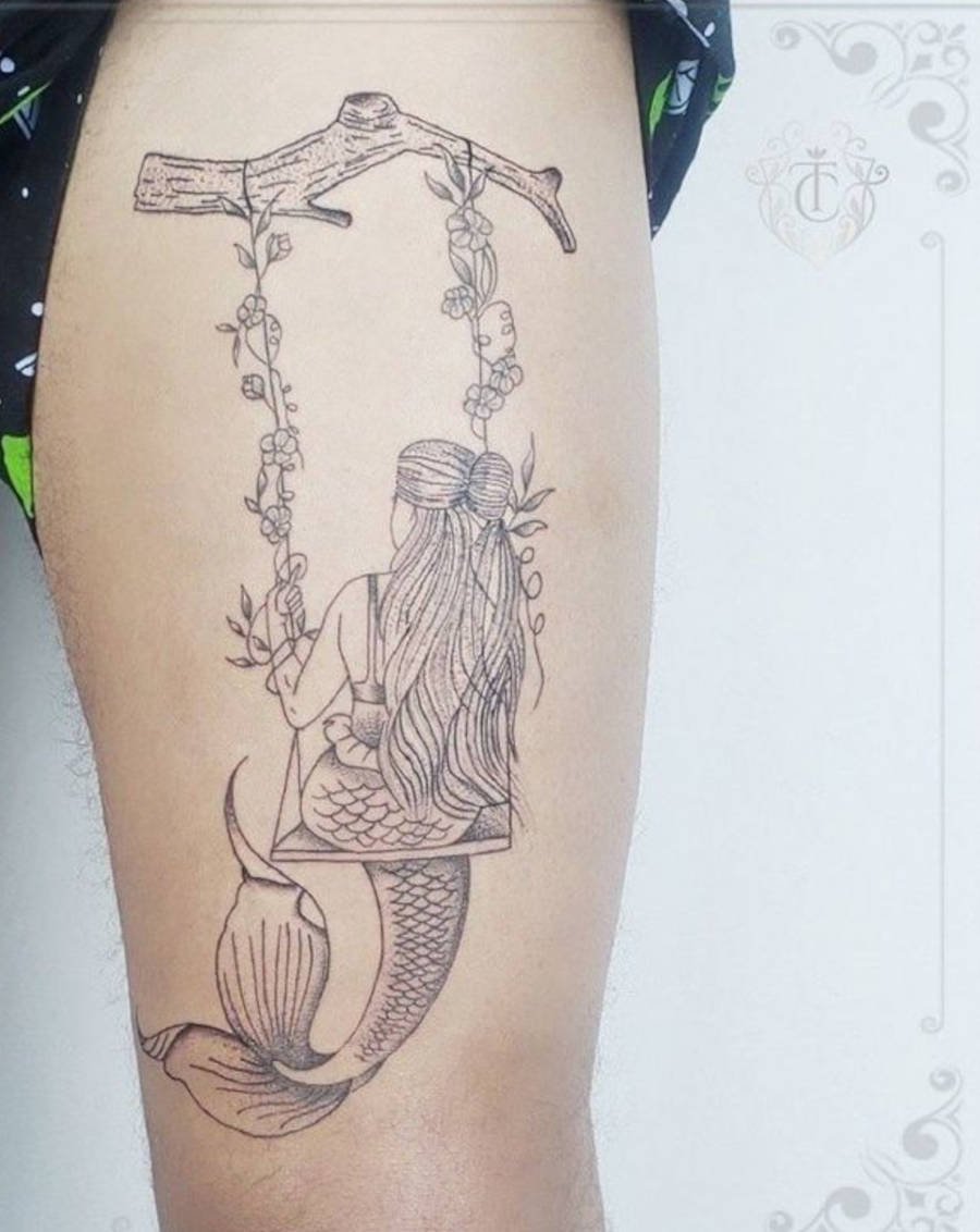Tatuagem de sereia em perna de homem