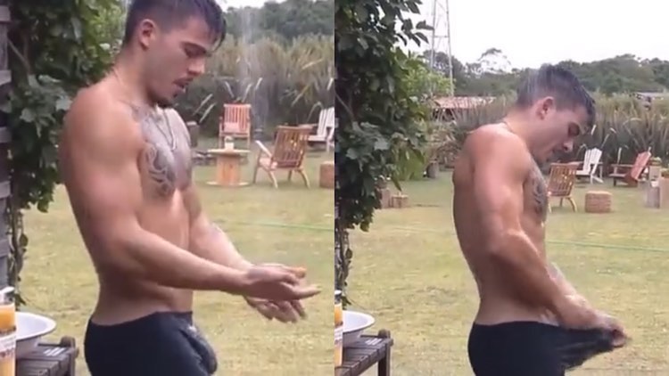 Thomaz Costa tomando banho em A Fazenda.