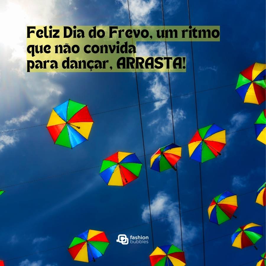 Foto de sombrinhas coloridas em céu azul com frase de feliz Dia do Frevo
