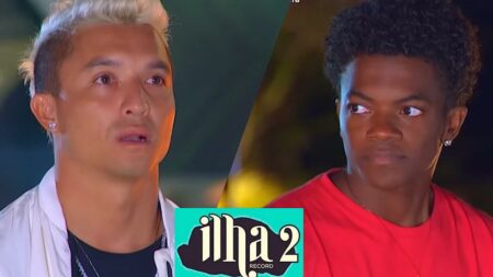 Naka e Kaik com cara de assustados durante noite de votação no deck montado pela produção do Ilha Record