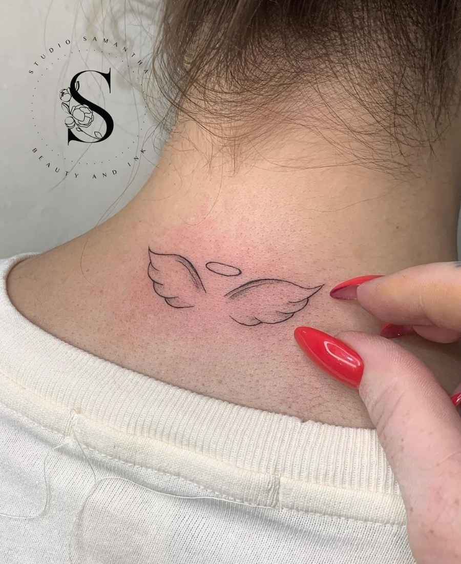 Foto de tatuagem de anjo de uma pessoa.