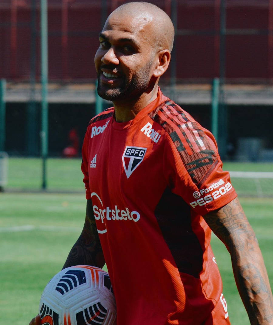 Jogador com a camisa do São Paulo.