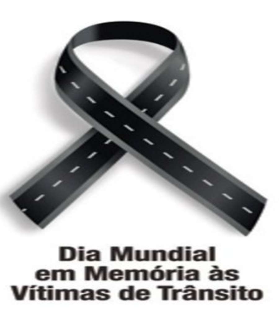 Fundo branco com símbolo de luto de estrada. Escrito de preto: "Dia Mundial em Memória às Vítimas de Trânsito".