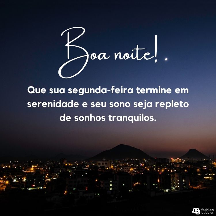 Foto de cidade iluminada à noite e frase "Boa noite! Que sua segunda-feira termine em serenidade e seu sono seja repleto de sonhos tranquilos."