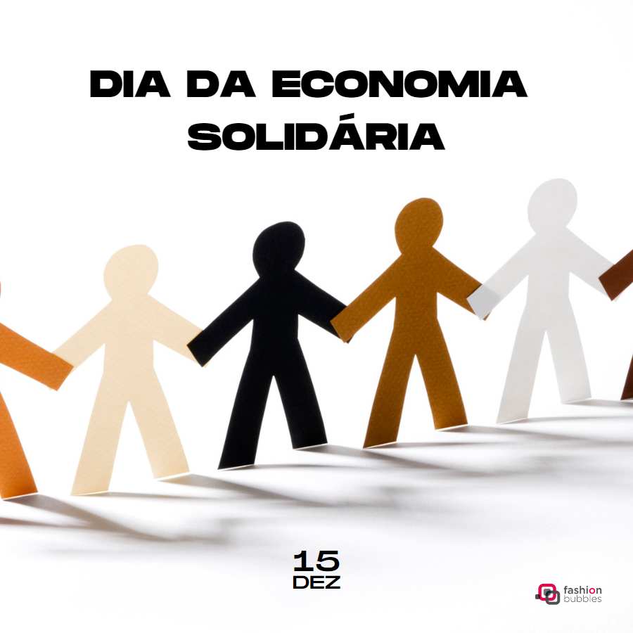 Foto de bonecos de papel. Escrito de preto: "Dia da Economia Solidária 15 de dezembro".
