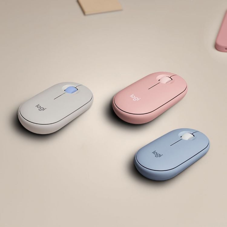 Três mouses na cor branco, rosa e azul.