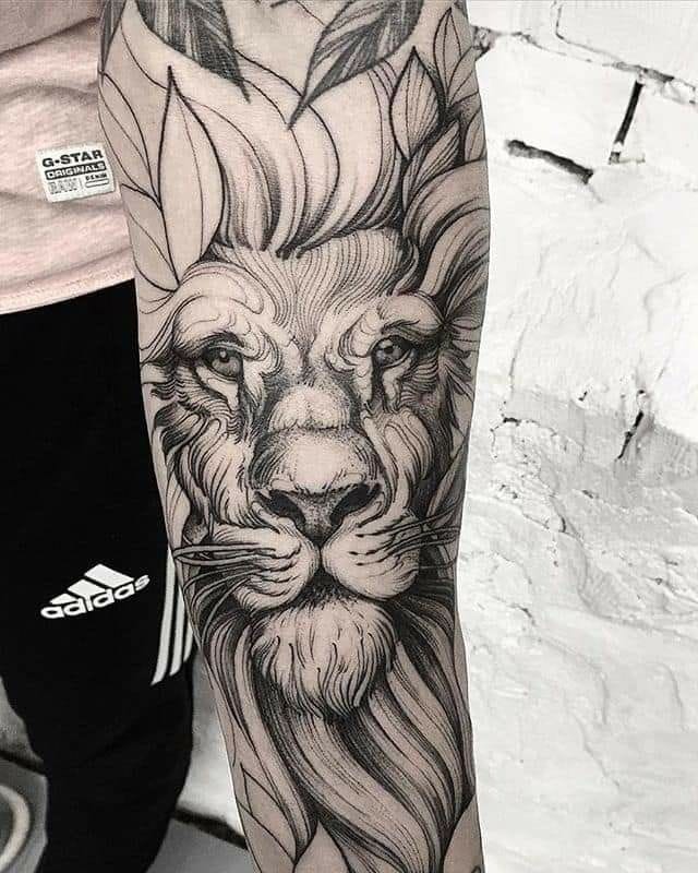 Tatuagem leão no braço