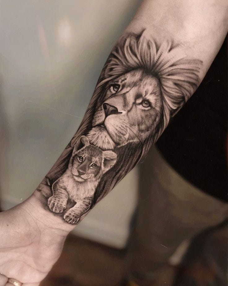 Tatuagem leão e filhote relalista