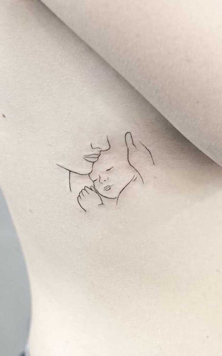 tatuagem mãe segurando recém-nascido