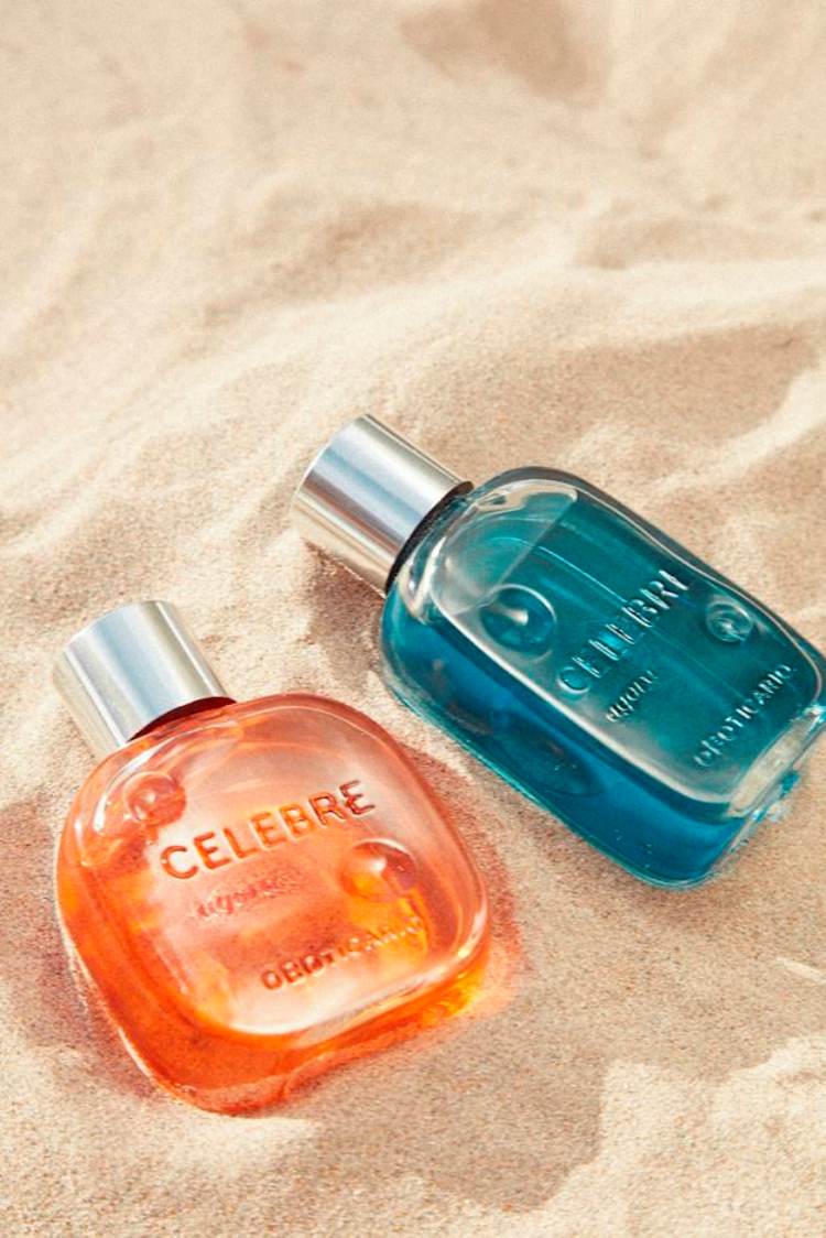 foto de dois perfumes dos lançamentos de beleza de junho, embalagem laranja e azul