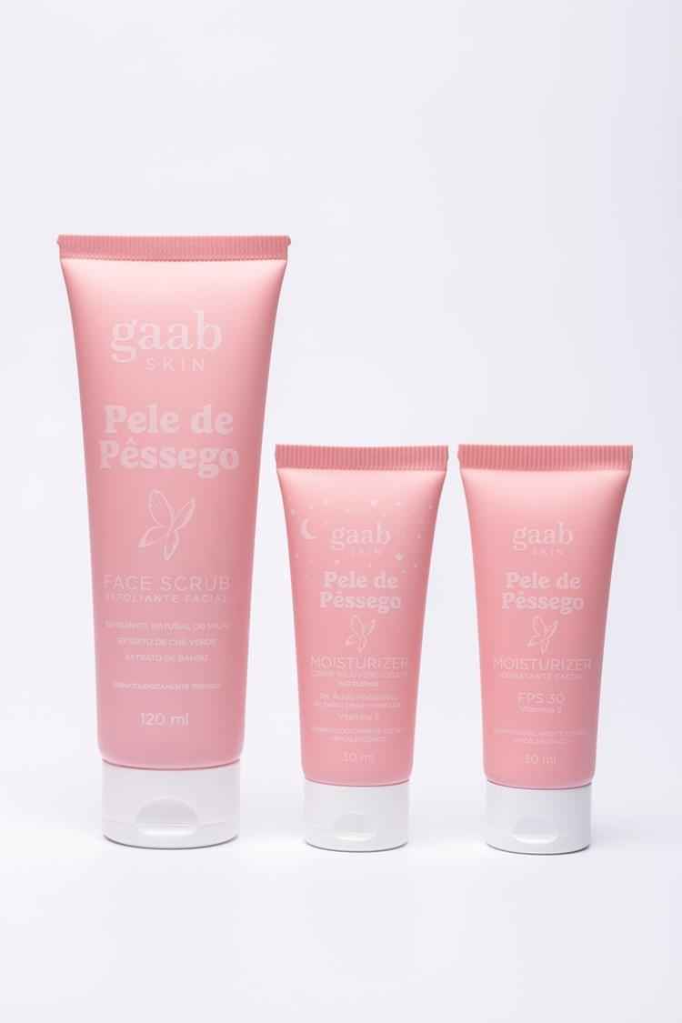 3 produtos de pele com embalagem rosa em bisnaga, 3 tamanhos