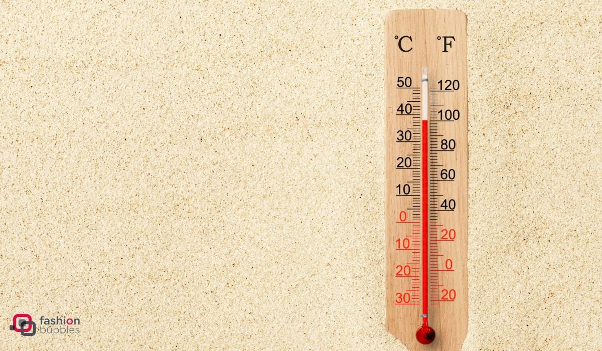 termômetro na areia marcando quase 40ºC, o que indica muito calor