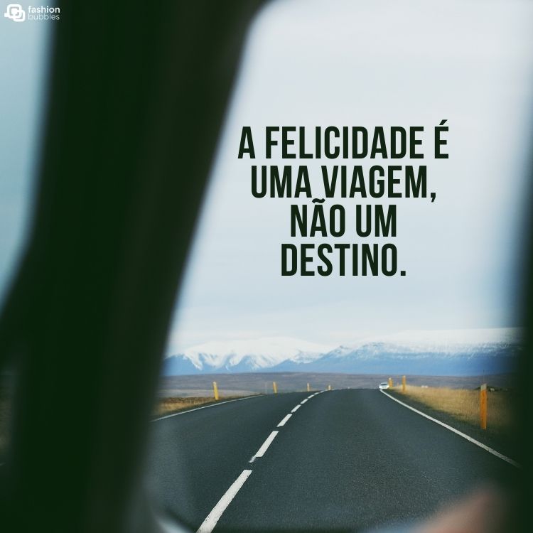 Foto de uma estrada com a frase "a felicidade é uma viagem, não um destino"