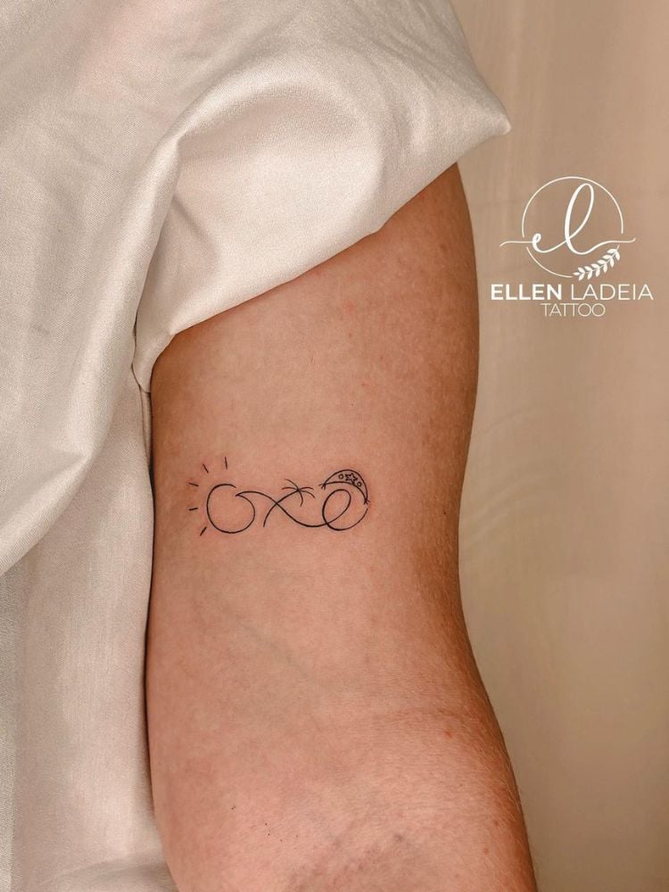 foto de tatuagem da palavra oxe no braço de uma pessoa