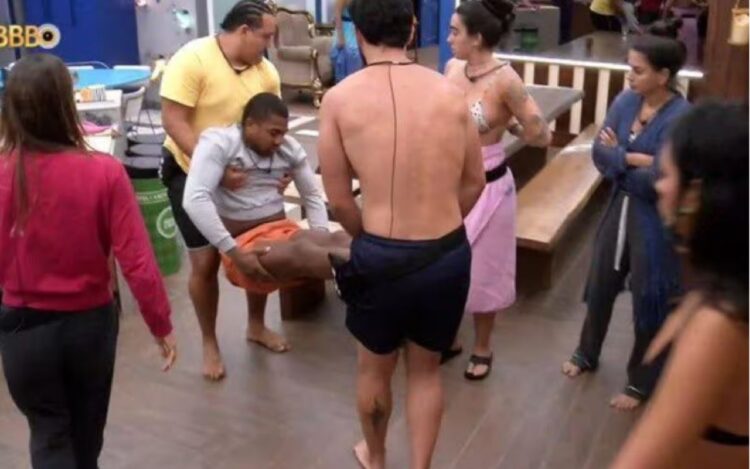 Davi passa mal e é carregado até o Confessionário