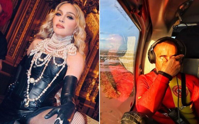 foto de Madonna no Rio de Janeiro ao lado de bombeiro chorando em helicóptero que sobrevoa as enchentes do Rio Grande do Sul